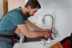 Remplacement de robinets de cuisine et salle de bain